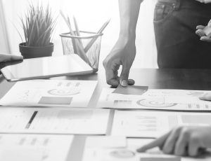 Teamwork Brainstorming Meeting and new startup project in workplace, Quality successful work concept, vintage effect.